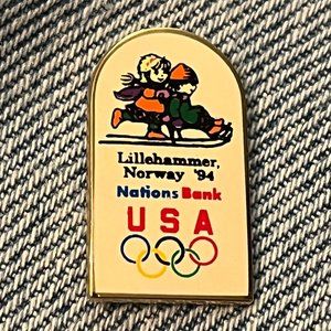 1994 Lillehammer Pin ~ Sponsor ~ Nations Bank ~ Mascots Kristin and Hakon